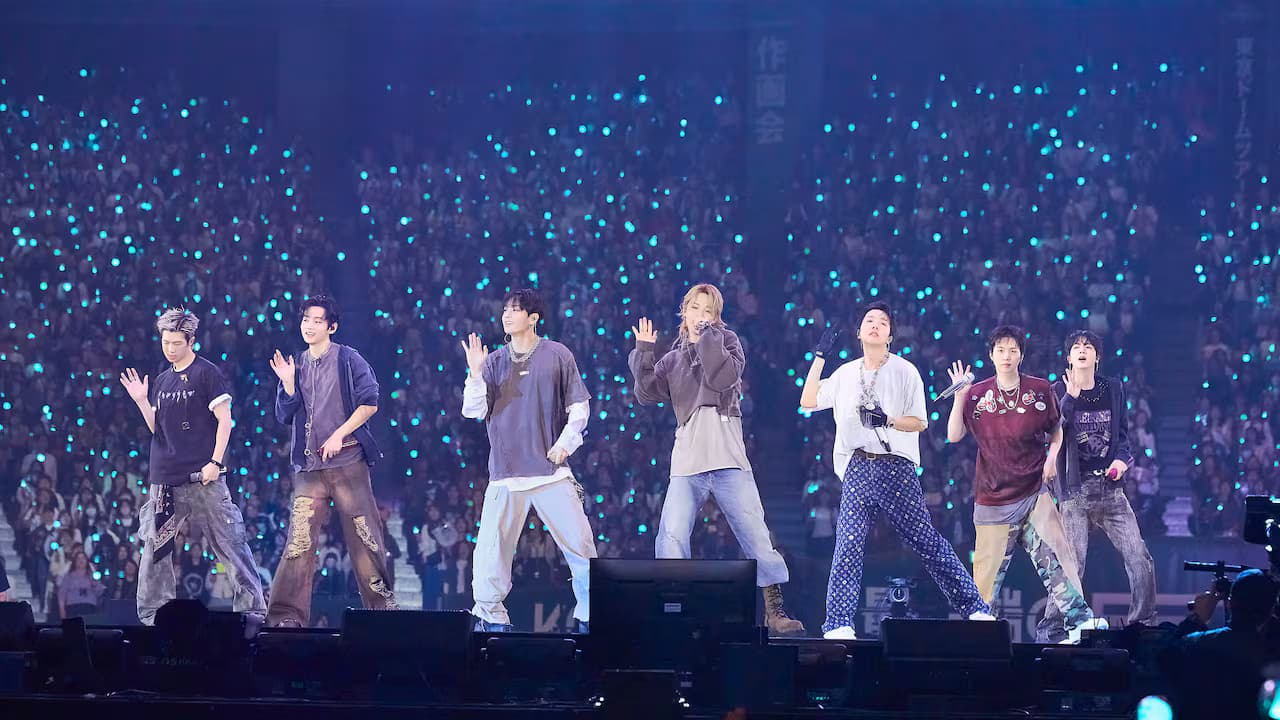 Los integrantes de BTS durante un concierto
