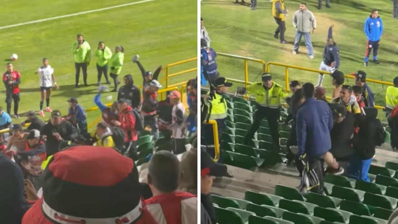 Policías intentan separar a hinchas en las tribunas del estadio La Independencia de Tunja