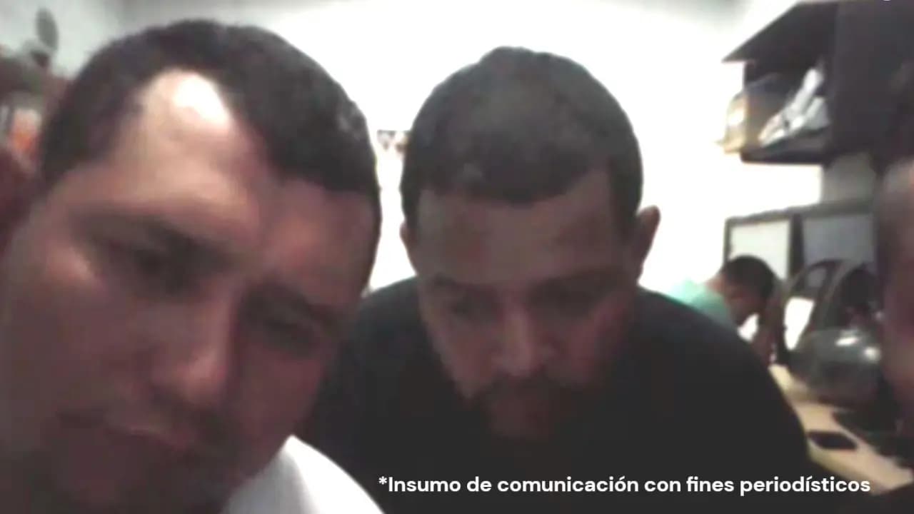 Dos de los procesados durante la audiencia virtual ante un juez de control de garantías