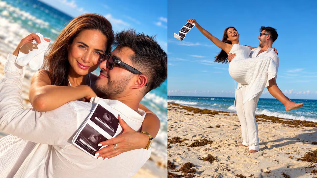 Johanna Fadul y Juanse Quintero muestran una ecografía en la playa