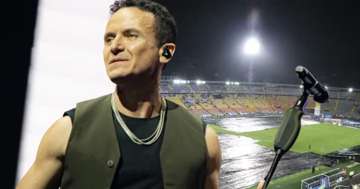 Fonseca y, al fondo, la gramilla encharcada del estadio El Campín