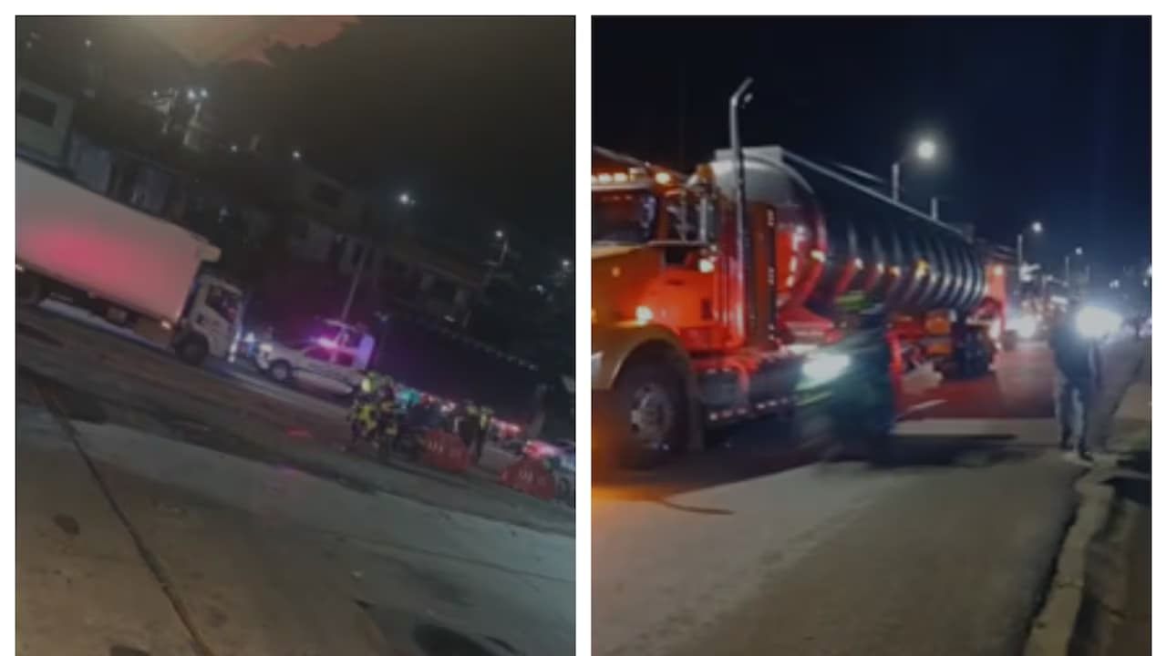 Policías y vehículos detenidos de noche en la vía Panamericana tras el ataque cerca de Popayán